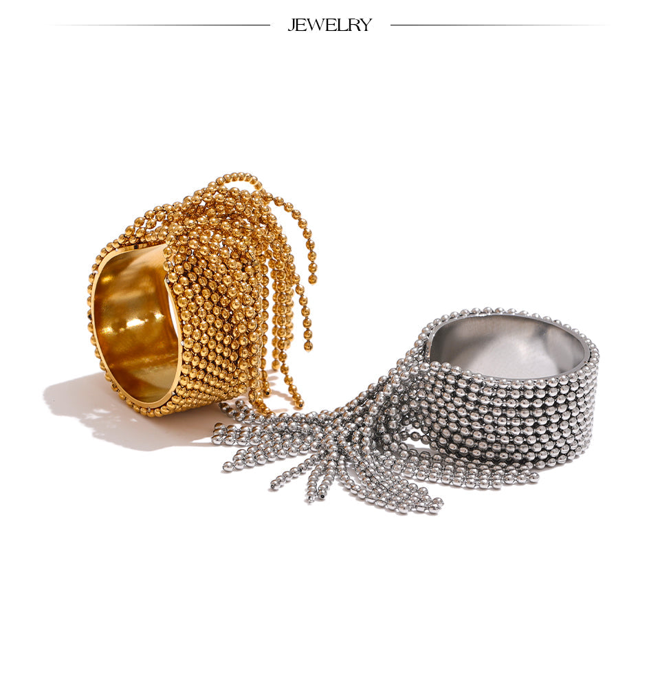 Statement-Ring mit Kette und Quaste